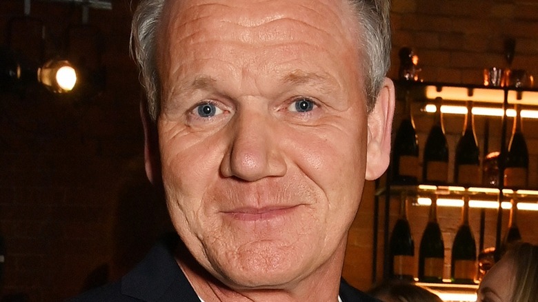 Gordon Ramsay smiling in bar