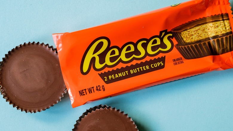 Reese's peanut butter cups on a light blue background
