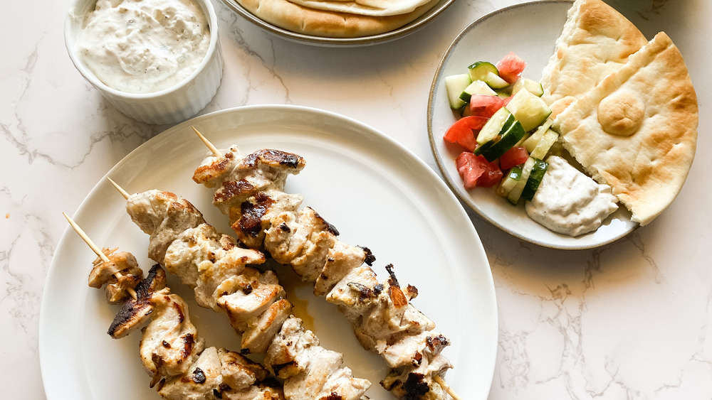 Greek Chicken Souvlaki skewers served on platter