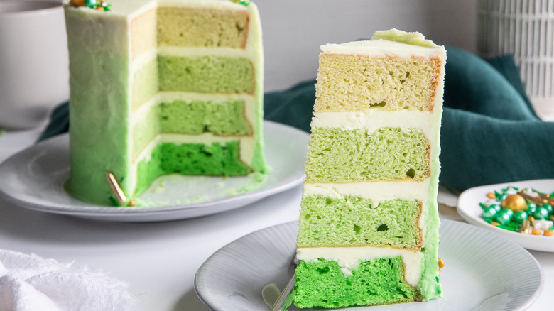 green ombre cake on plate 