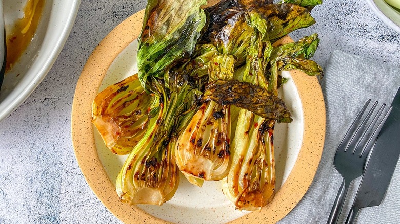 grilled bok choy on plate
