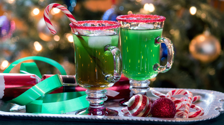 green holiday cocktails with holiday decor
