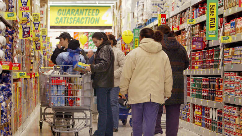 Shoppers inside a Food 4 Less grocery store in Chicago, Illinois
