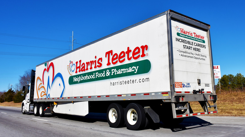 The side of a tractor trailer truck with Harris Teeter grocery store logo