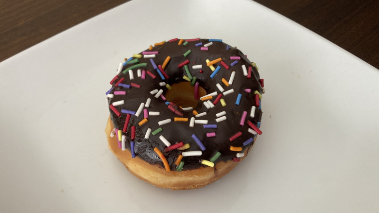 Members Mark iced chocolate donut sideview