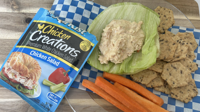 StarKist Chicken Salad in a lettuce cup with carrots and crackers on the side