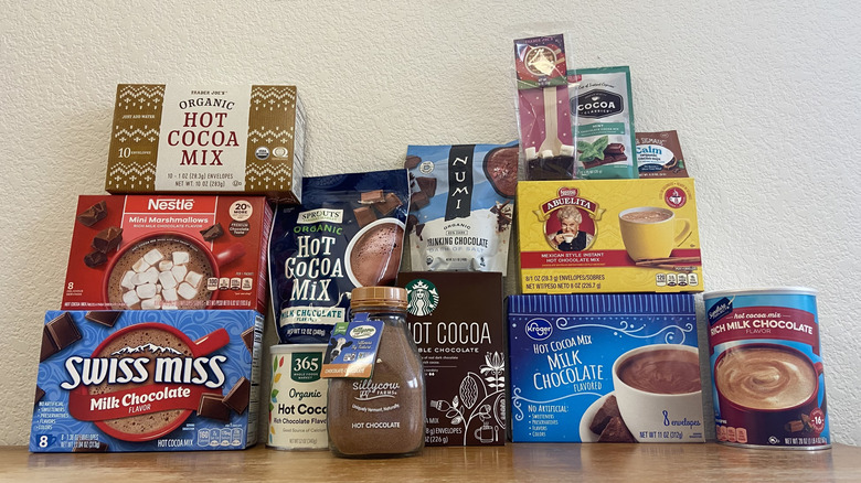all of the hot chocolate mixes stacked on one another