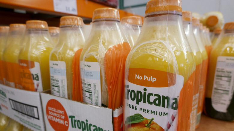 Bottles of Tropicana orange juice on shelf
