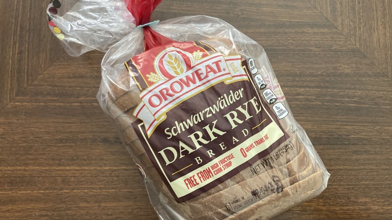 Oroweat Scwartzwälder Dark Rye bread in packaging on table