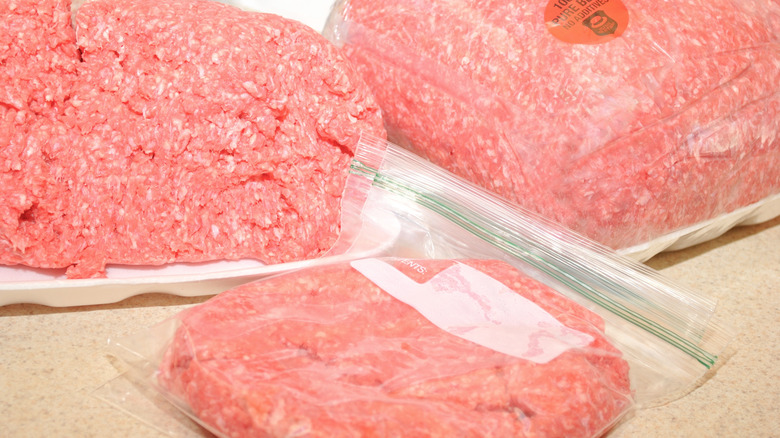 bulk meat being divided up