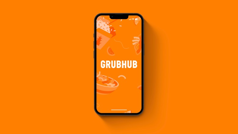 Orange Grubhub logo on a phone