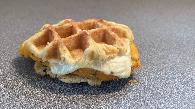 Sweet heat fried chicken and waffle sandwich