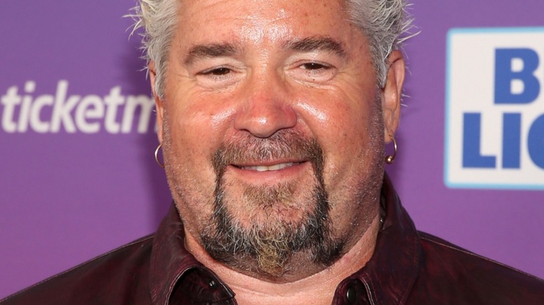 sweaty Guy Fieri smiling