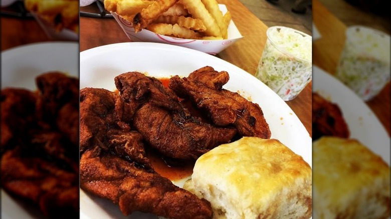 Fried chicken plated with biscuits