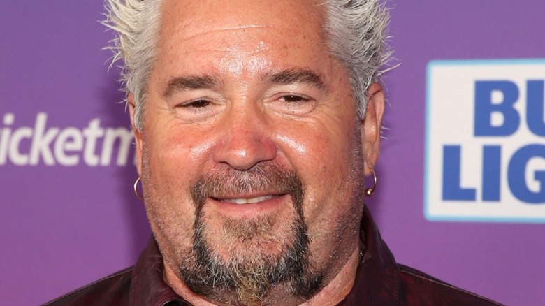 Guy Fieri purple background