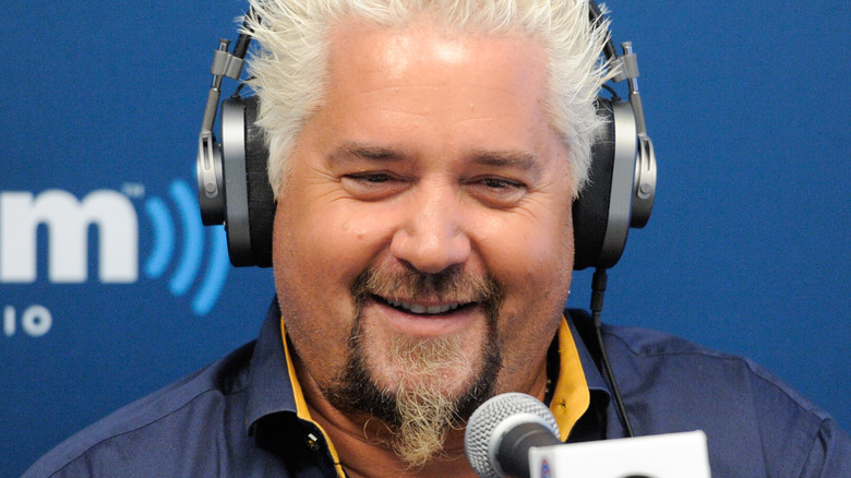 Guy Fieri laughing