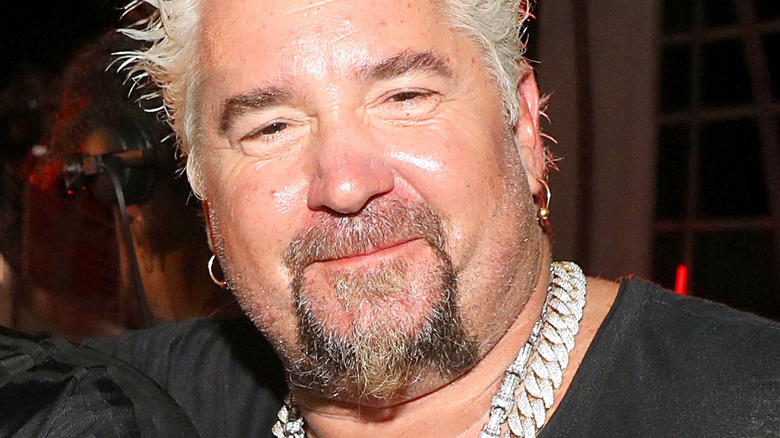 Guy Fieri with slight smile