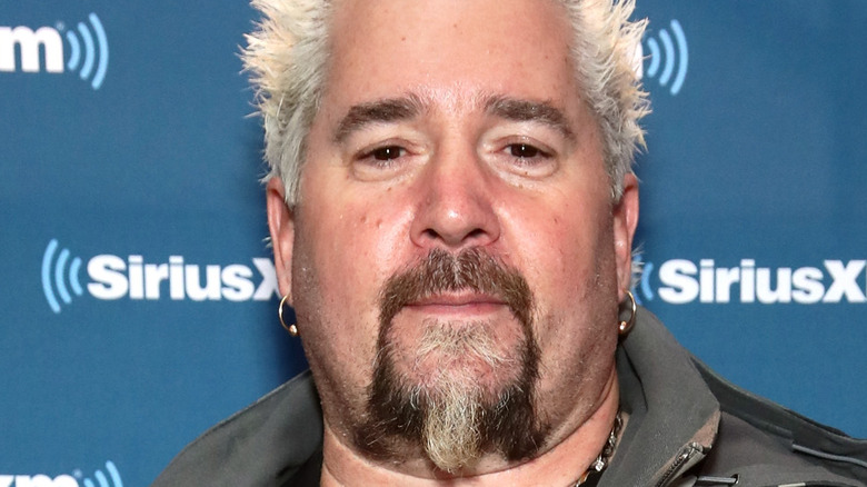 Guy Fieri wearing earrings