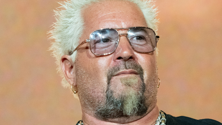 Guy Fieri poses