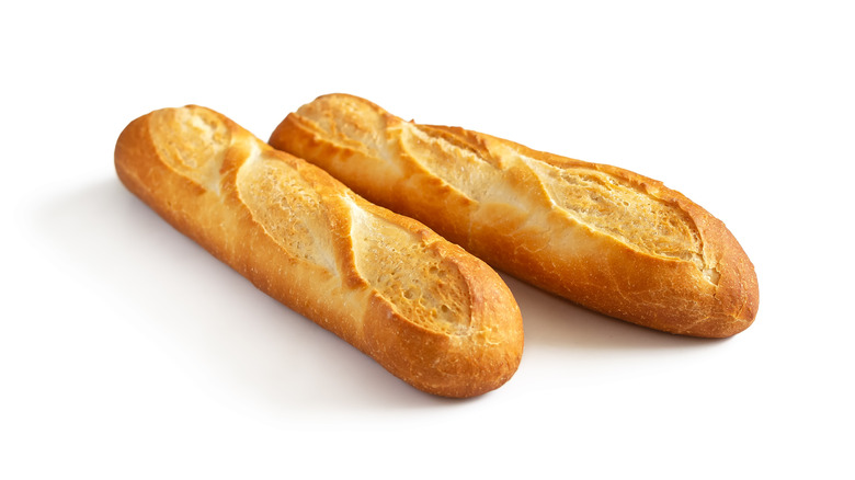 Two baguettes on a white background