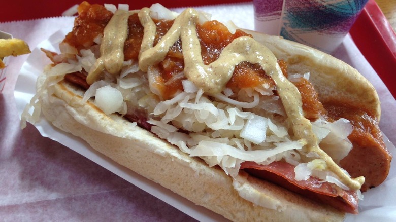 A New Englander dog with kraut, mustard, relish sauce