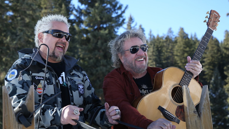 Guy and Sammy with a guitar