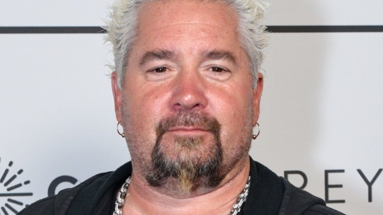 Guy Fieri wearing earrings