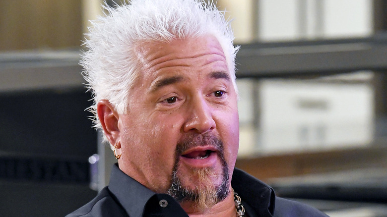 guy fieri speaking on set