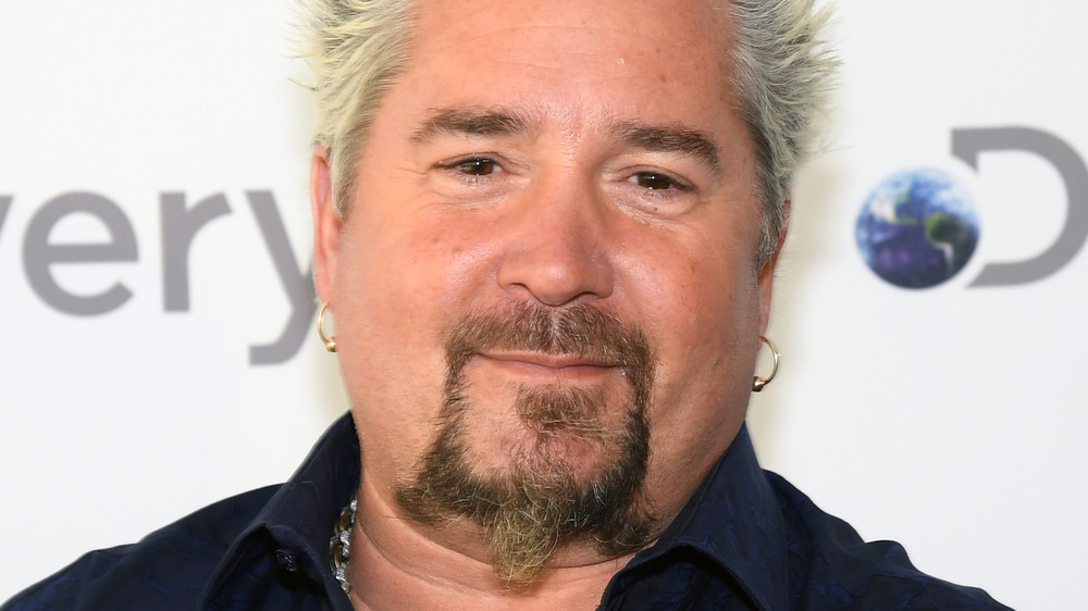 Guy Fieri crossing his arms