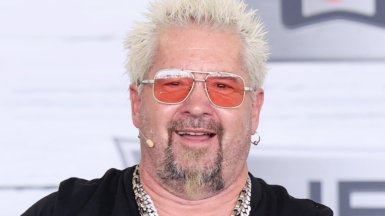 Guy Fieri smiling in close-up