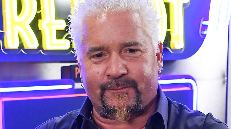 Guy Fieri smirking