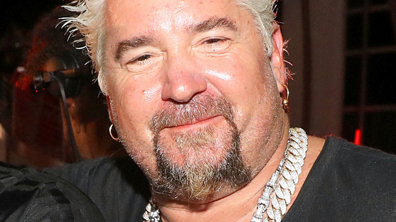 Guy Fieri with slight smile