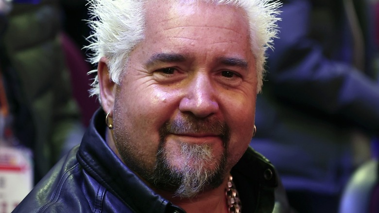 Close-up of Guy Fieri wearing leather jacket