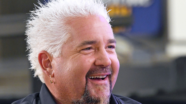 Guy Fieri smiles