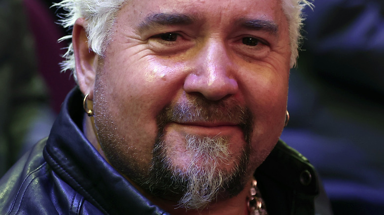 Guy Fieri with slight smile