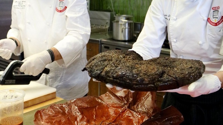 H-E-B chefs preparing brisket