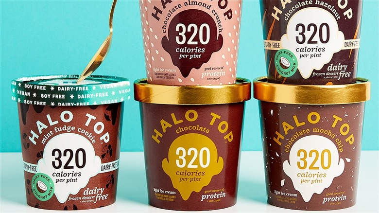 Five cartons of Halo Top ice cream and a spoon