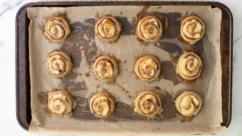 Baked pinwheels on baking sheet