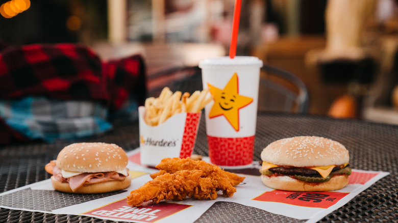 Hardee's burgers on a black table