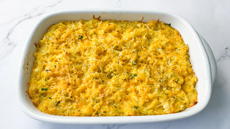 Cheese-topped casserole in pan