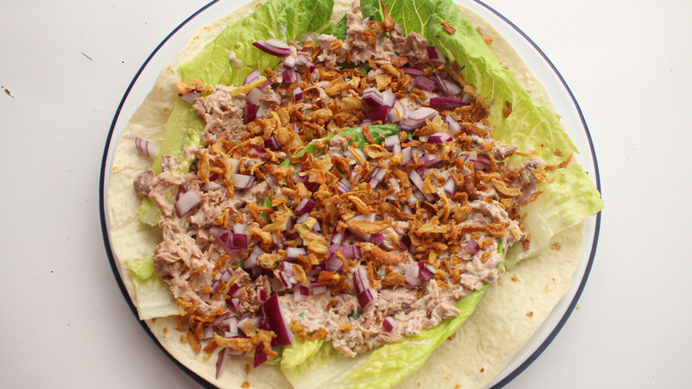 lettuce with tuna mix on plate