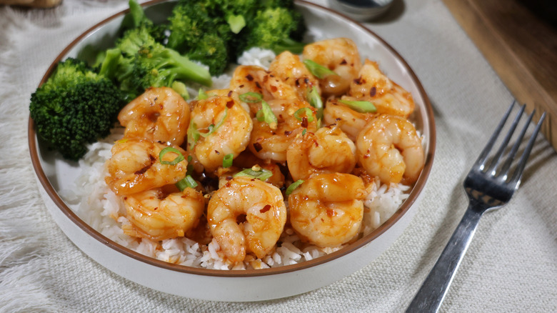 spicy honey garlic shrimp over rice and broccoli