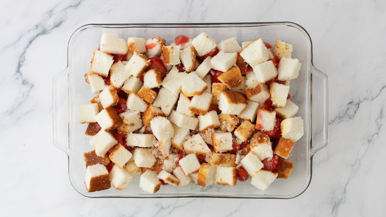 Angel food cake cubes in baking dish