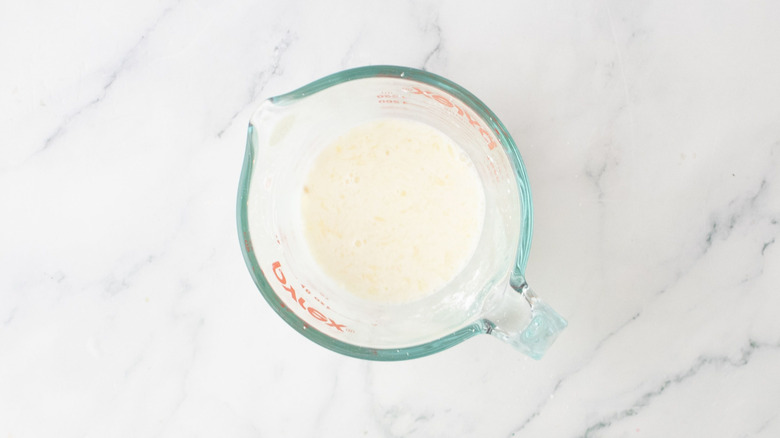 Cornstarch slurry in measuring cup
