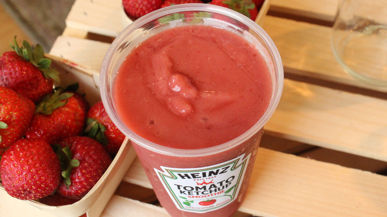 Overhead view of a frozen ketchup smoothie, showing its pale red color