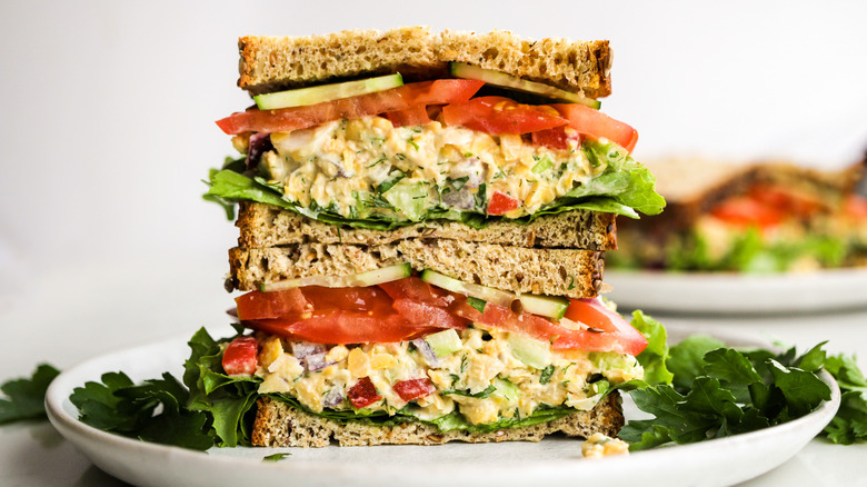 chickpea salad sandwich on white plate