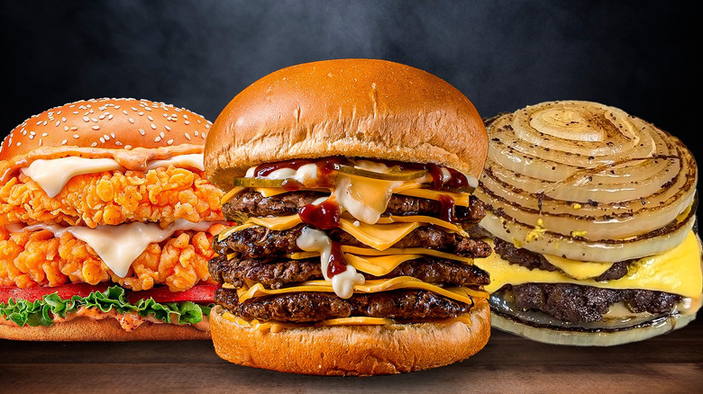 Three large fast food burgers