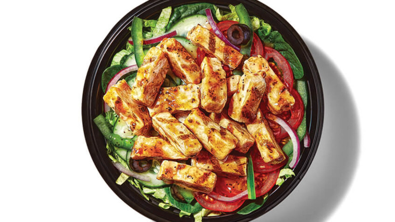 Subway chicken teriyaki bowl with lettuce tomato and onion