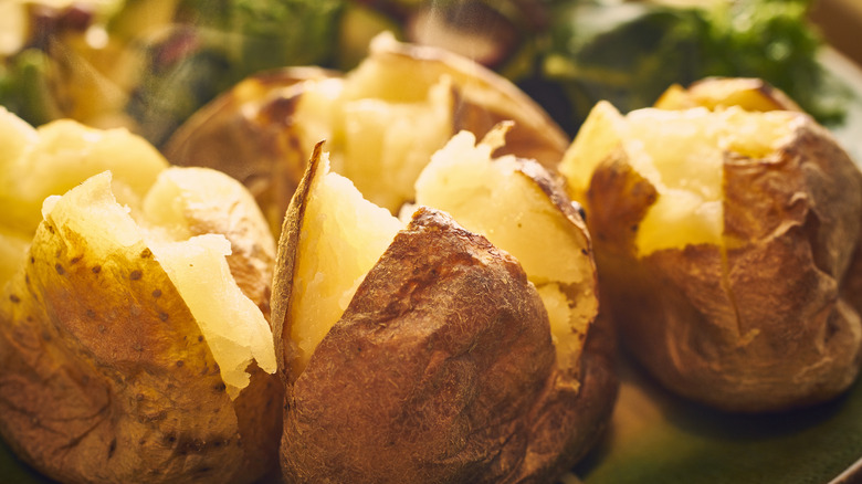 baked potatoes cut open