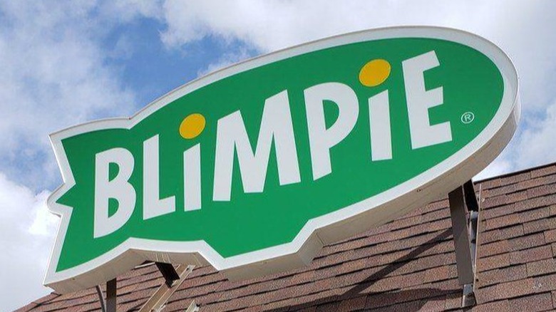 Blimpie sign against blue sky